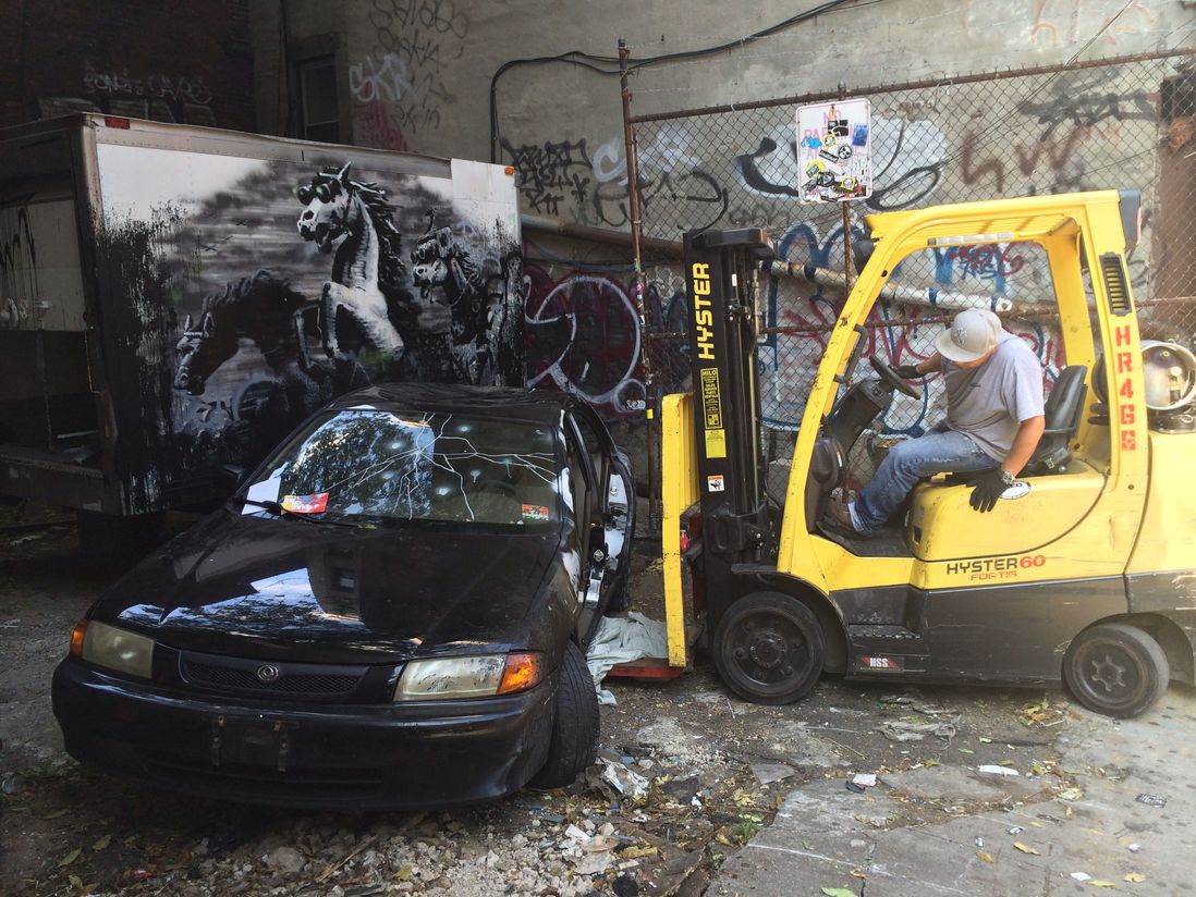 Around 2 p.m., the car is towed. (Photo by <a href="http://instagram.com/tal">Tal Atlas</a>)